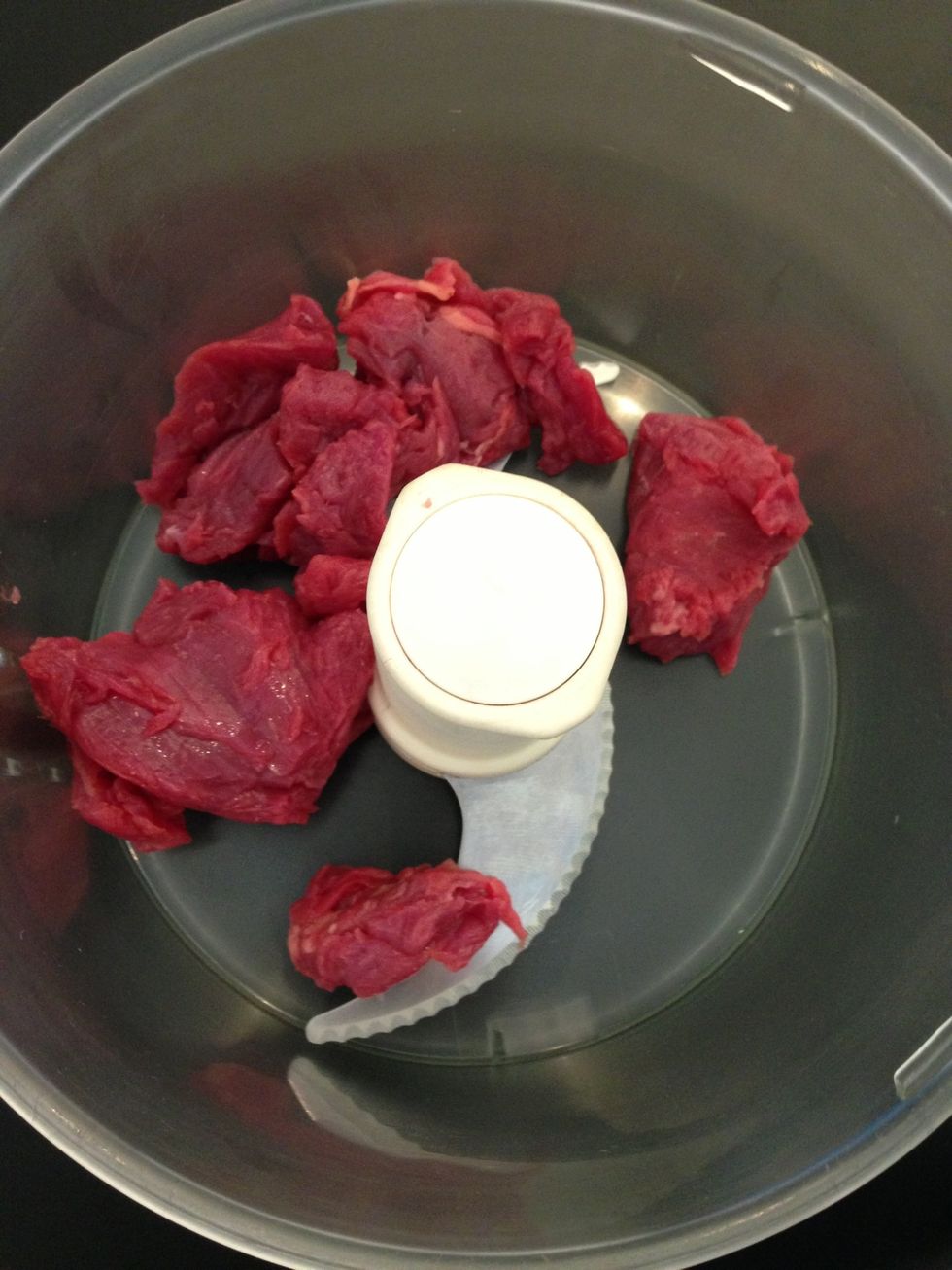 Mince the coarsely . Pulse 5 times, check and go on until desired texture