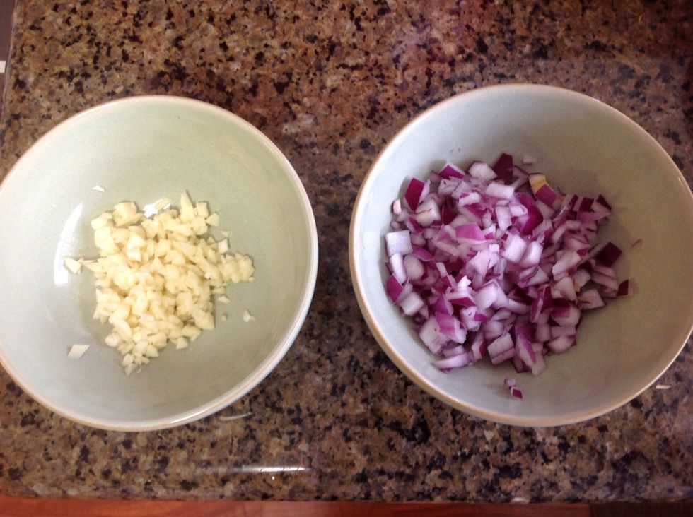 Mince the garlic and red onion and set aside.