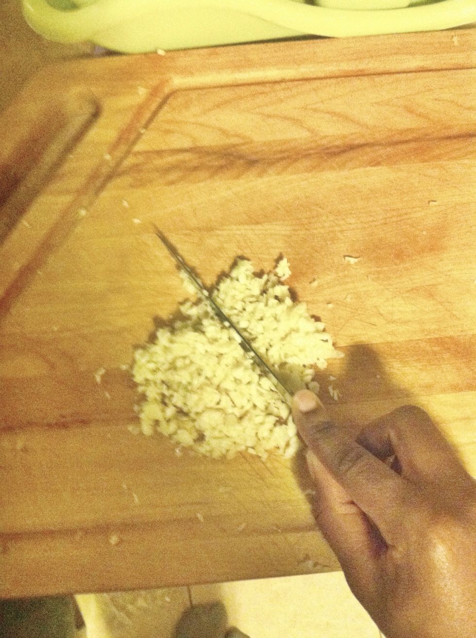 Mince the garlic and then add it into the bowl