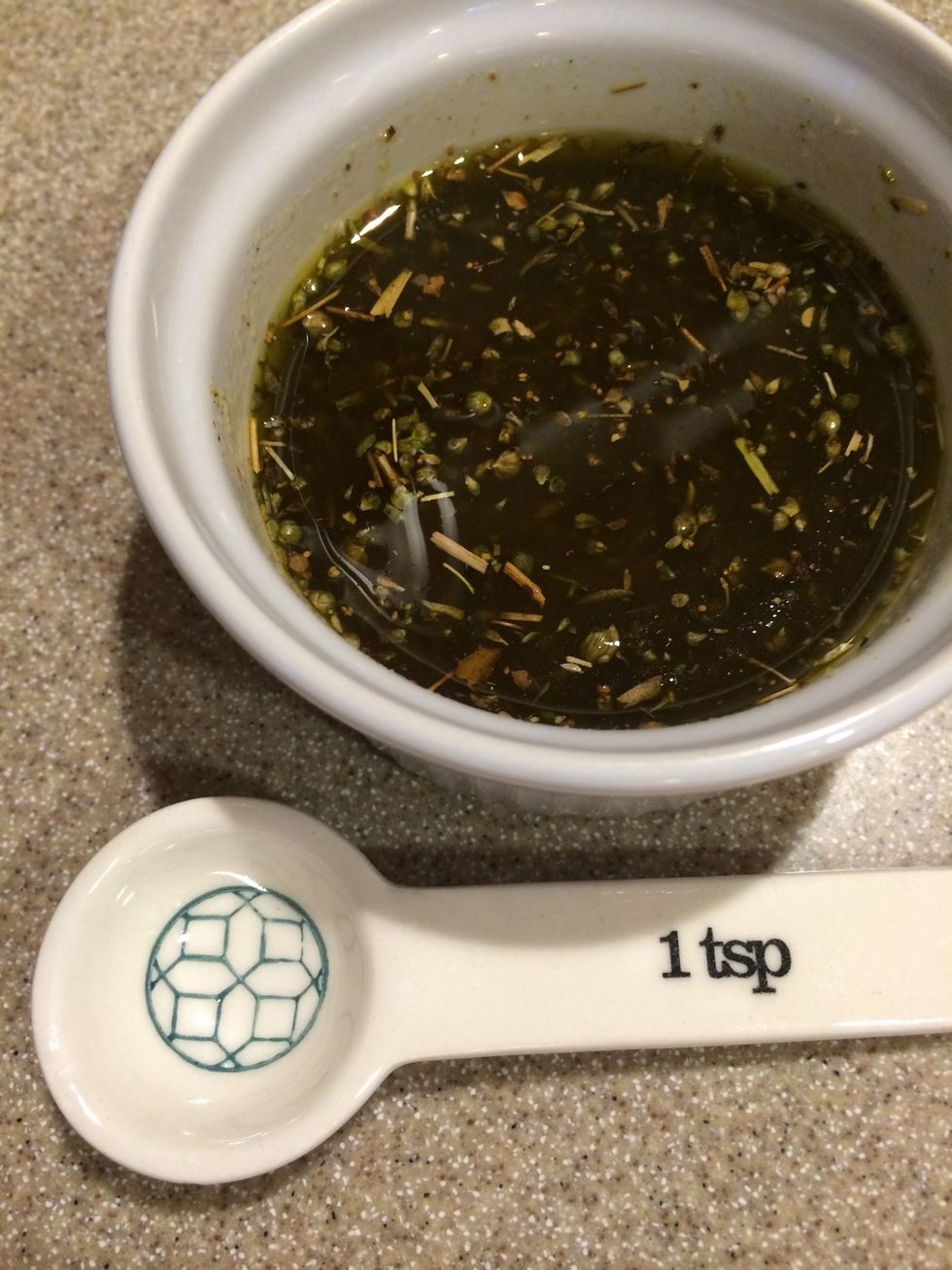 Mince your garlic and add the dried spices. Mix it all together with the rest of the olive oil. Let it sit for a bit (you will use this when you finish cooking it in the oven).