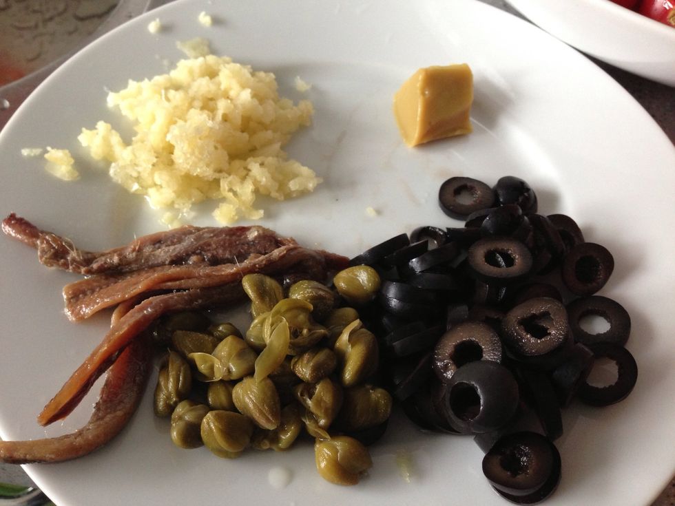 Minced Garlic, Black Olive, Capers, Anchovy. Soup-stock(I used concentrated soup add hot water, top right)