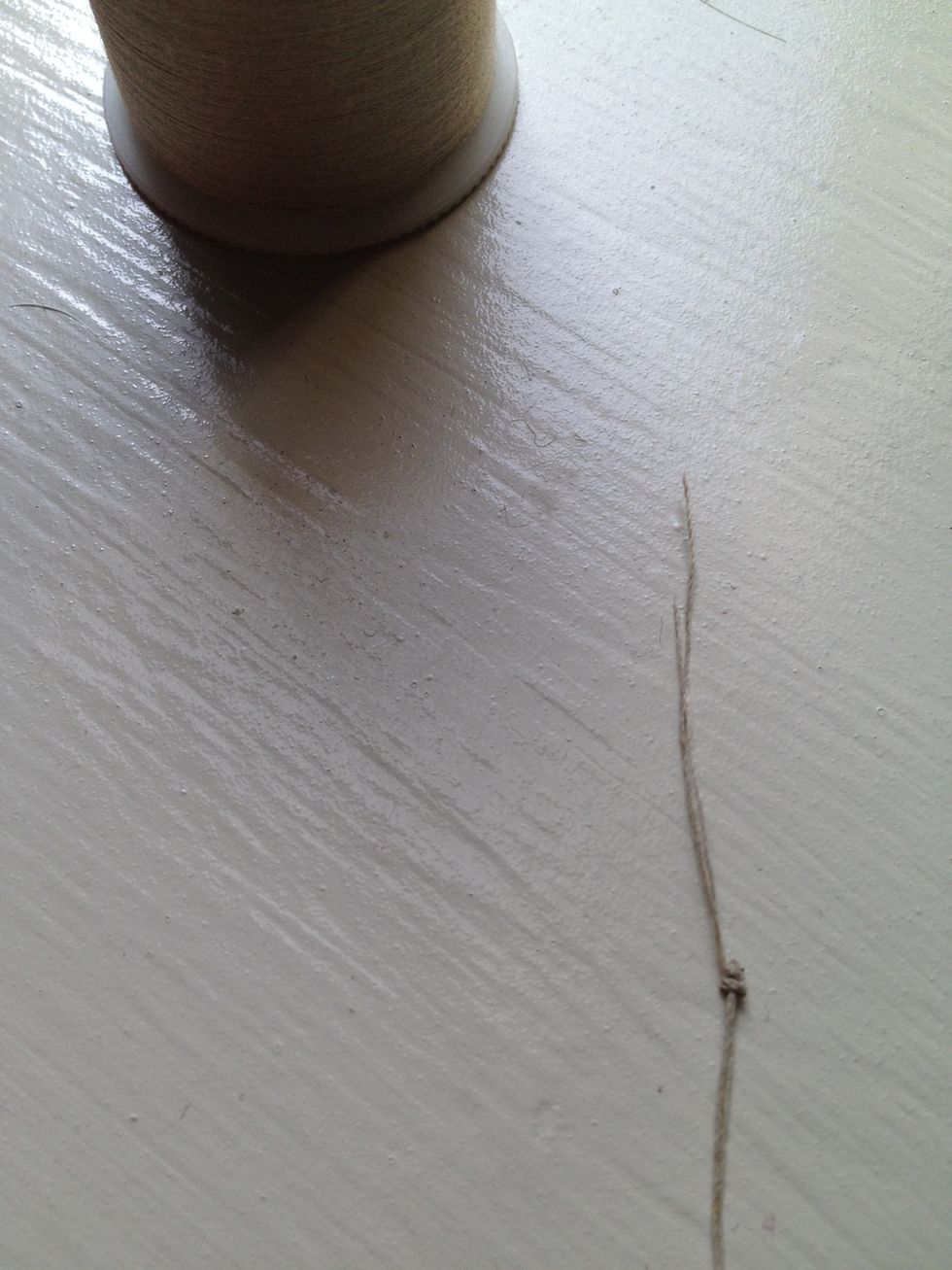 Mine is a thick wool coat, so a smaller knot is fine. Just want to make sure your knot won't pull through the fabric and loosen your button again.