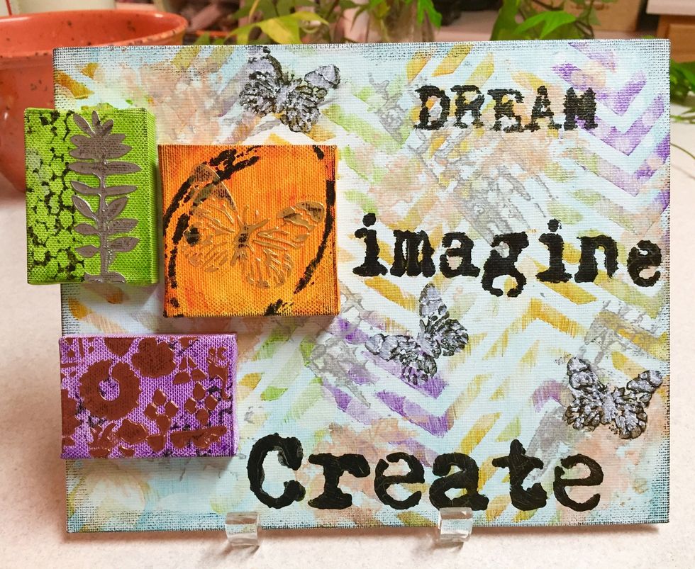 mini canvases adhered.
