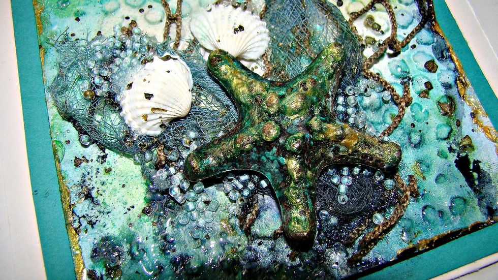 Mini shells were applied using gel medium.