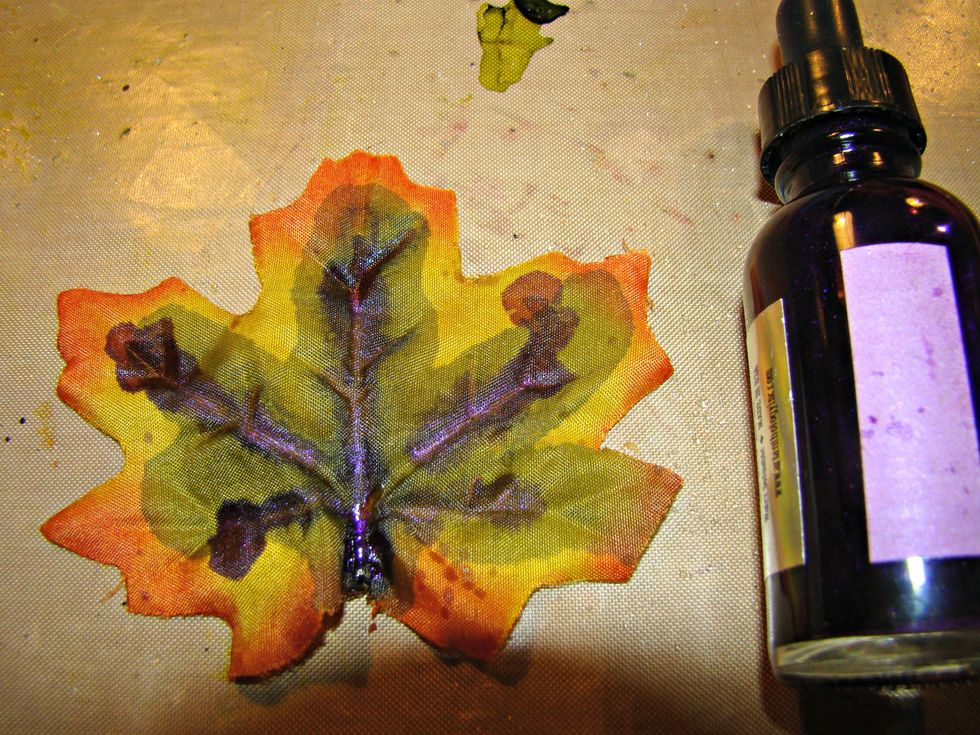 Minx inks were added to the dull inexpensive leaves for added glimmer and vibrancy.