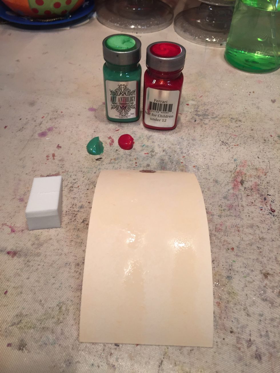 Mist tag with water.  Tap out small amounts of Parakeet and Barbie onto your craft sheet.