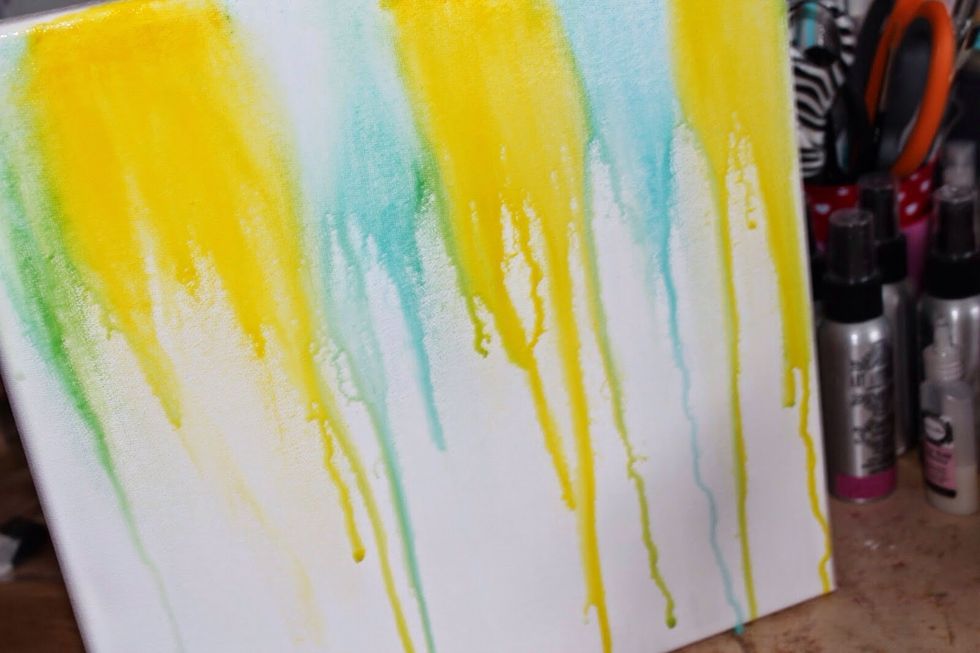 Mist water onto canvas.