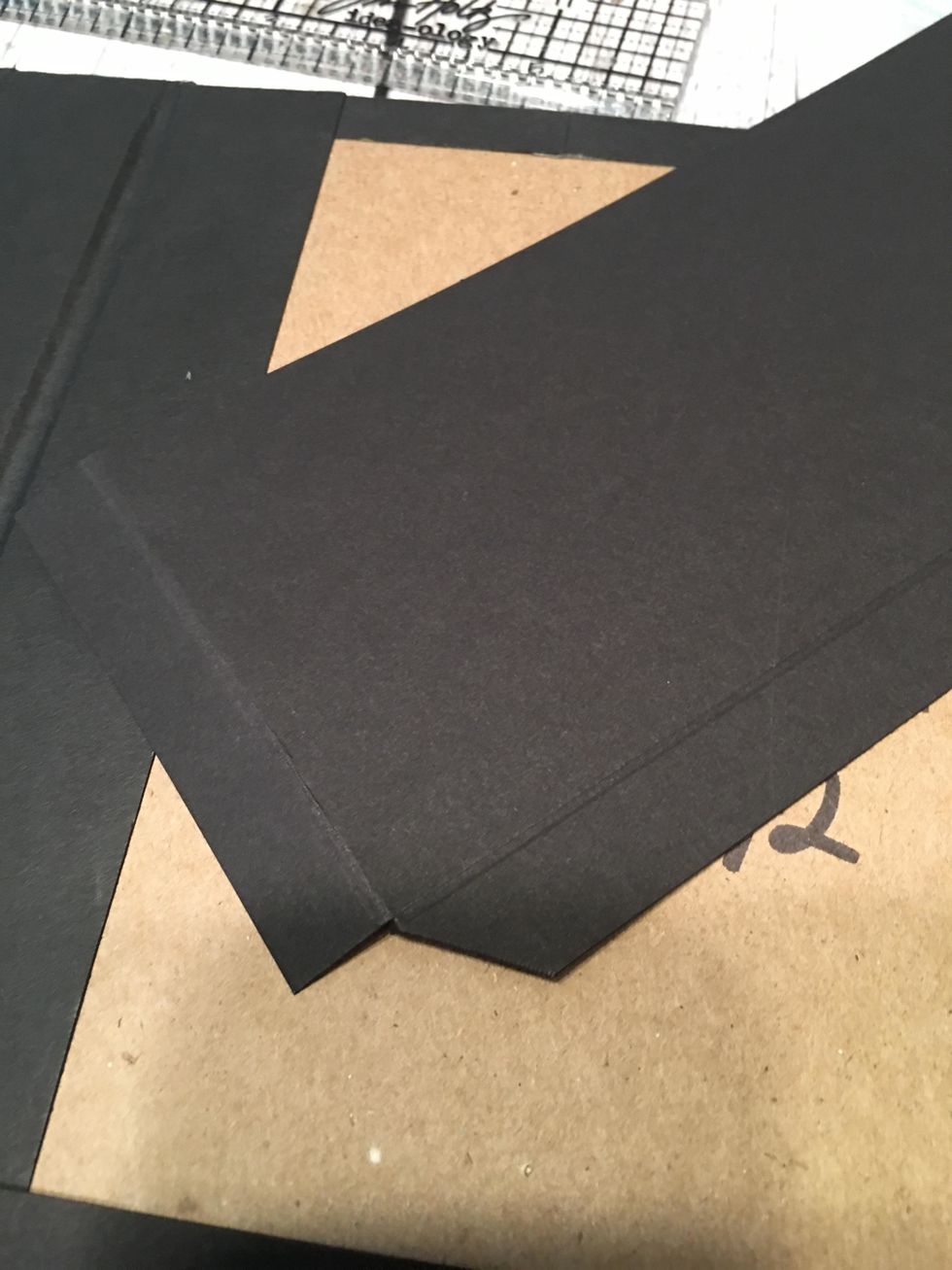 Miter cut both bottom corners as shown.