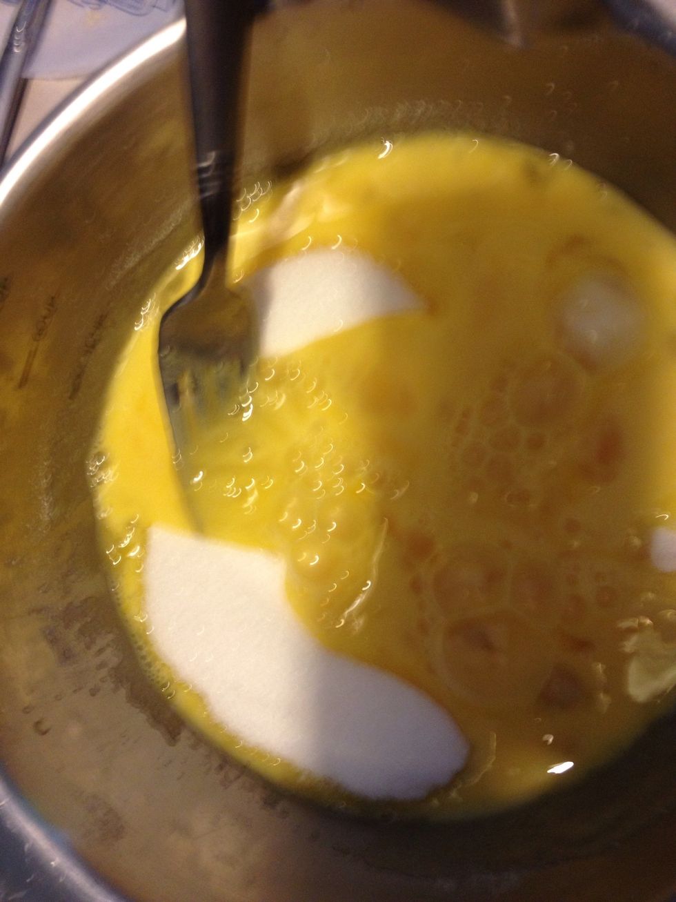 Mix 1 1/2 cups sugar and 1/2 cup flour together then add to eggs and mix well. I like my pie tart, but you can add more sugar for a sweeter pie.