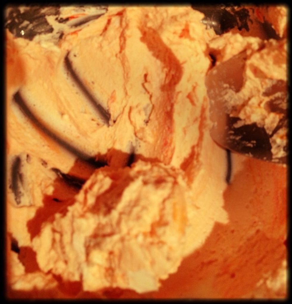 Mix 150 g of cottage cheese with cherry flavor, vanilla extract, food colorant and sweetener.