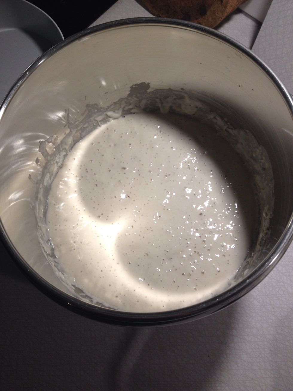 Mix 150 g of flour, 150 g of lukewarm water and 100 g of sourdough. Let it ferment under cover for 5-6 hours. Wait until it's bubbly and about twice the size, that's when the pre-ferment is ready.