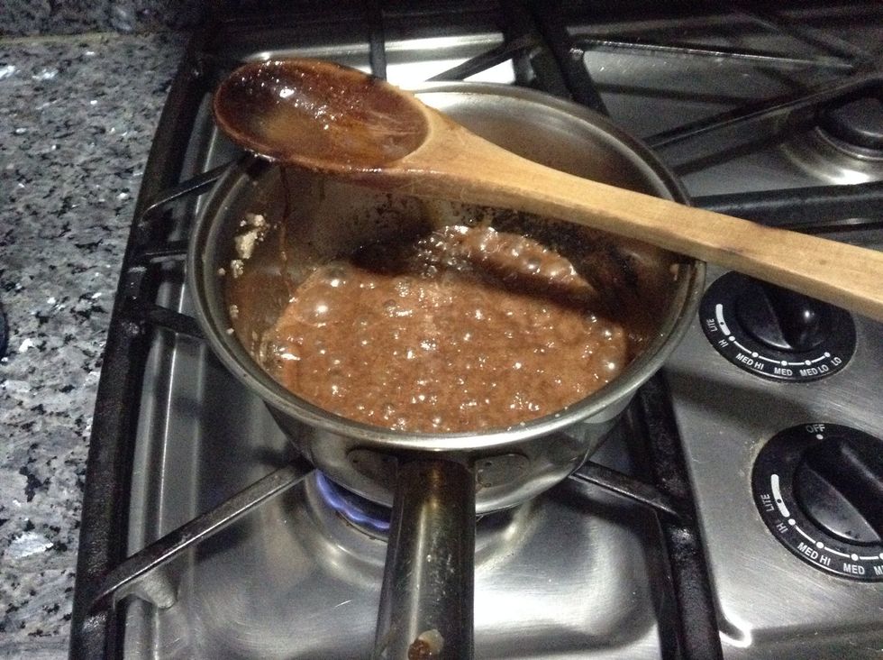 Mix 3 tablespoon of chocolate (powder) with 1 tablespoon of butter and 1 teaspoon of sugar. Mild to low heat. If you want to, add 5 teaspoon of milk to make it soft.