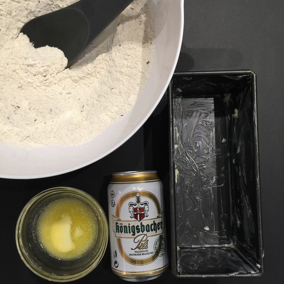 Mix: 350 g flour ( little bit less than 3 cups) + salt+baking powder. Add the beer. Mix