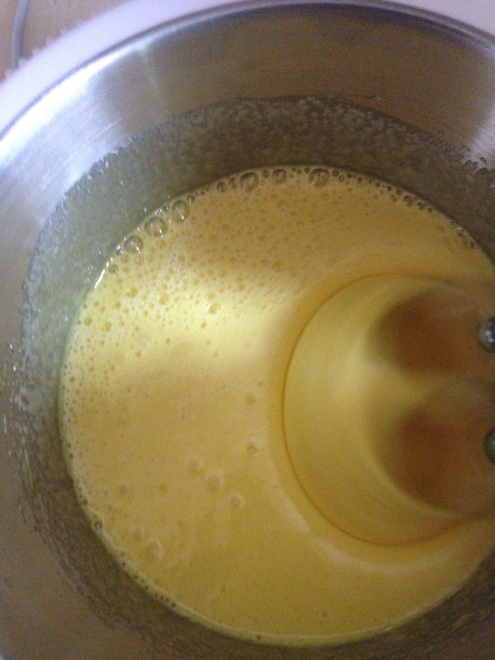 Mix 4 large room Temp eggs and a cup of sugar( 200g)