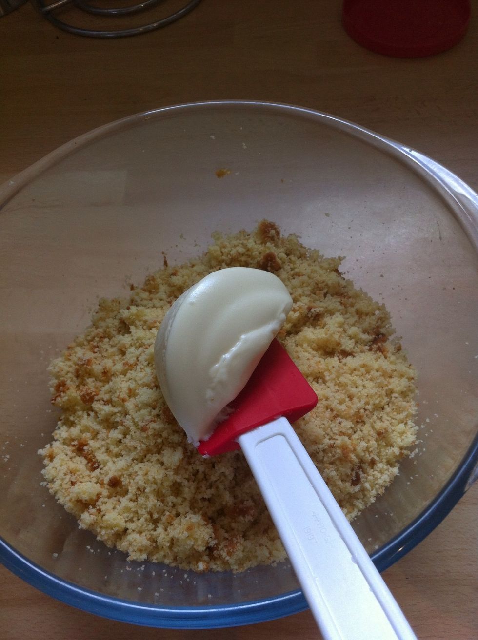 Mix a dollop of icing in with the crumbs.