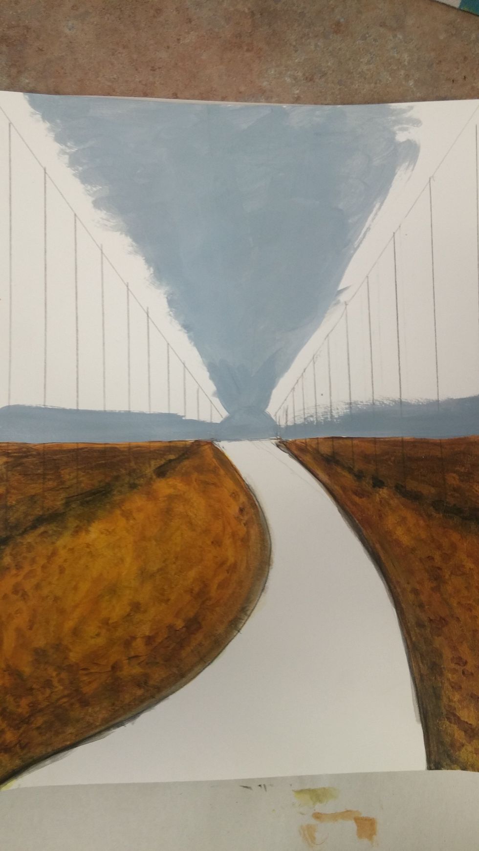 Mix a sky color best fitting the season. (Fall has a blue-gray) Fill in the areas you think the sky would peak through the leaves or trunks of trees.