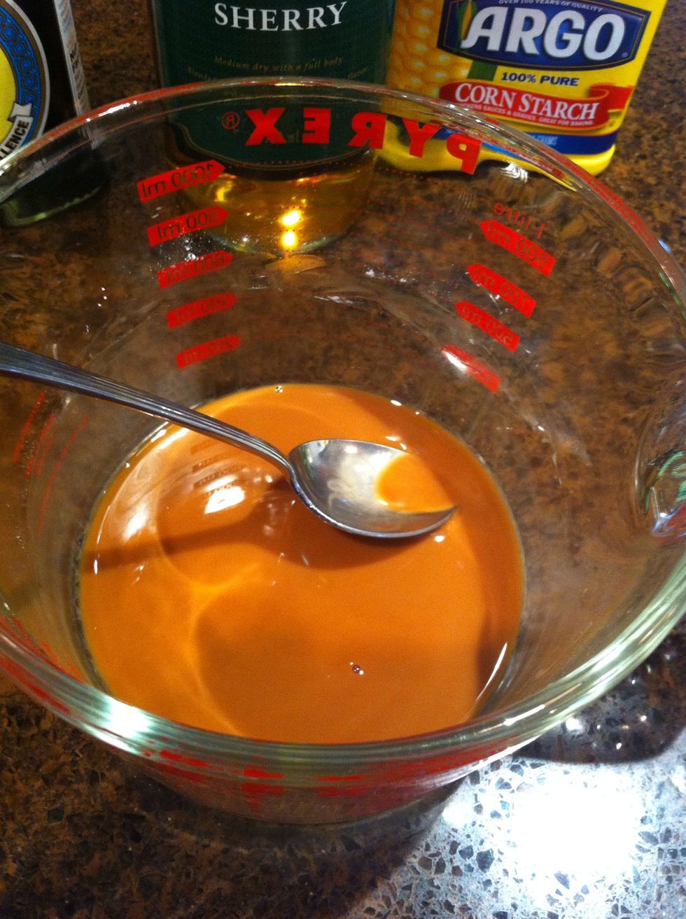 Mix a tablespoon of corn starch, two tablespoons of soy sauce and two tablespoons of either dry sherry or saki