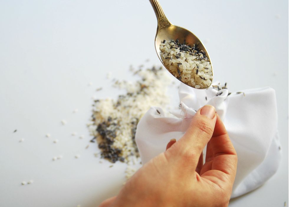 Mix about 1/2 in kg rice with lavender flowers, pour the filling in through the opening you left and then sew by hands or sewing machine.