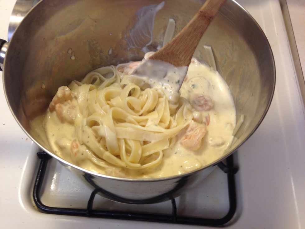 Mix Alfredo sauce and noodles