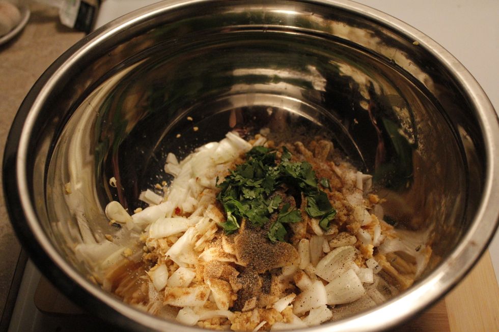 Mix all ingredients in a bowl, and lightly blend the mixture in a food processor. Don't blend it too much, you want to be able to form patties with the mixture.