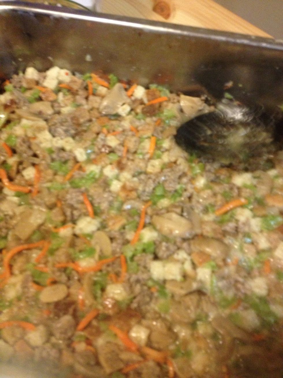 Mix all ingredients together! Add 1quart of chicken broth to moisten stuffing. Make sure it's really wet!