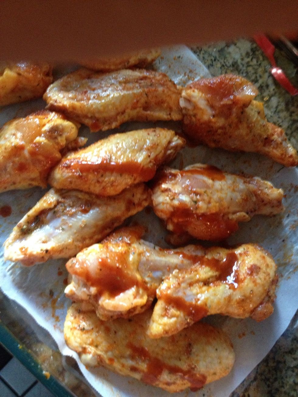 Mix all seasonings and mix wings, then pour some Tapatio on the wings!