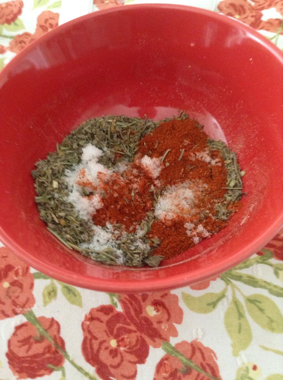 Mix all the dry herbs and spices in a bowl (see the supplies list) - sage, oregano, paprika, rosemary, garlic powder, thyme, poultry seasoning, salt and pepper. Mix well.