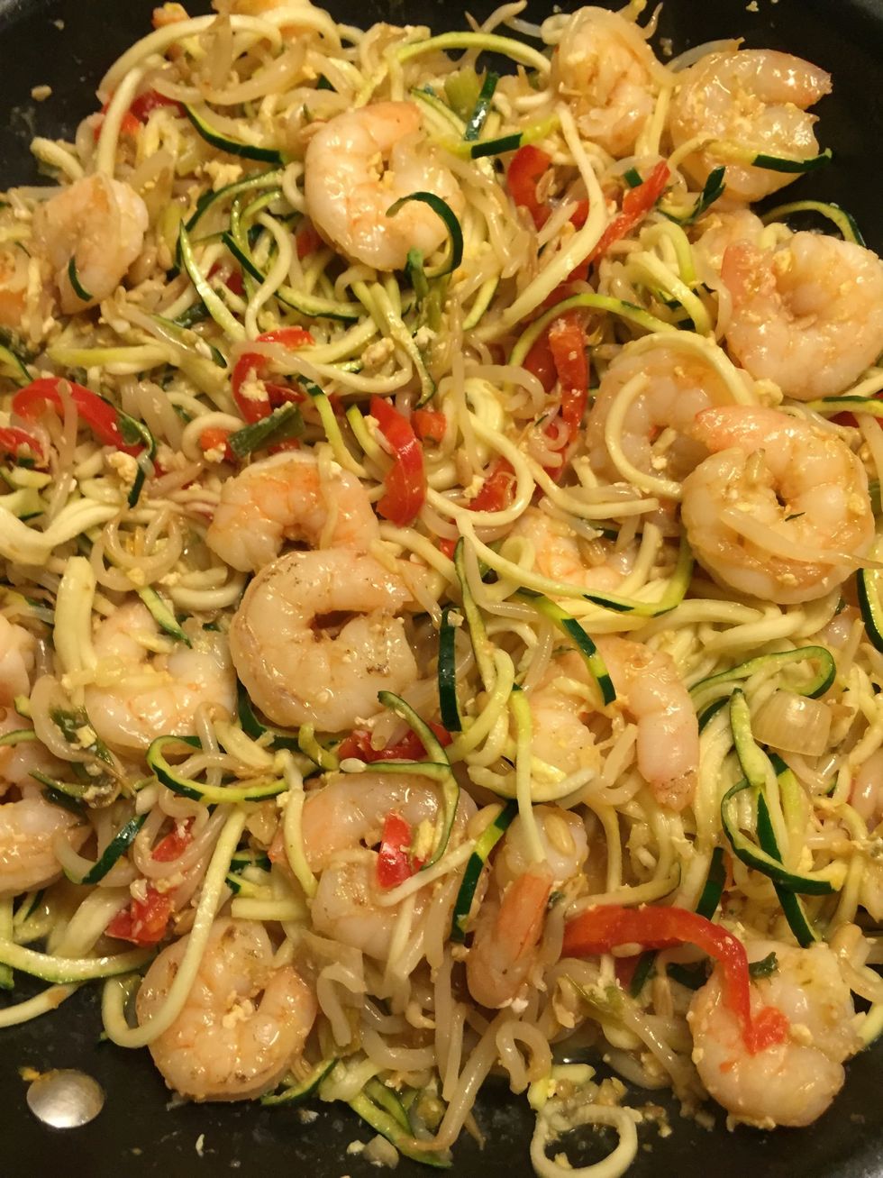 Mix all the ingredients. Cook for a few minutes until zoodles are heated through.