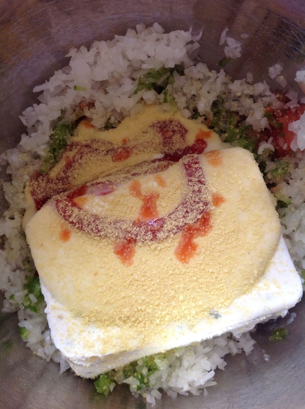 Mix all the ingredients into a bowl and mix it all together. Make sure that the soft cheese is completely mixed.