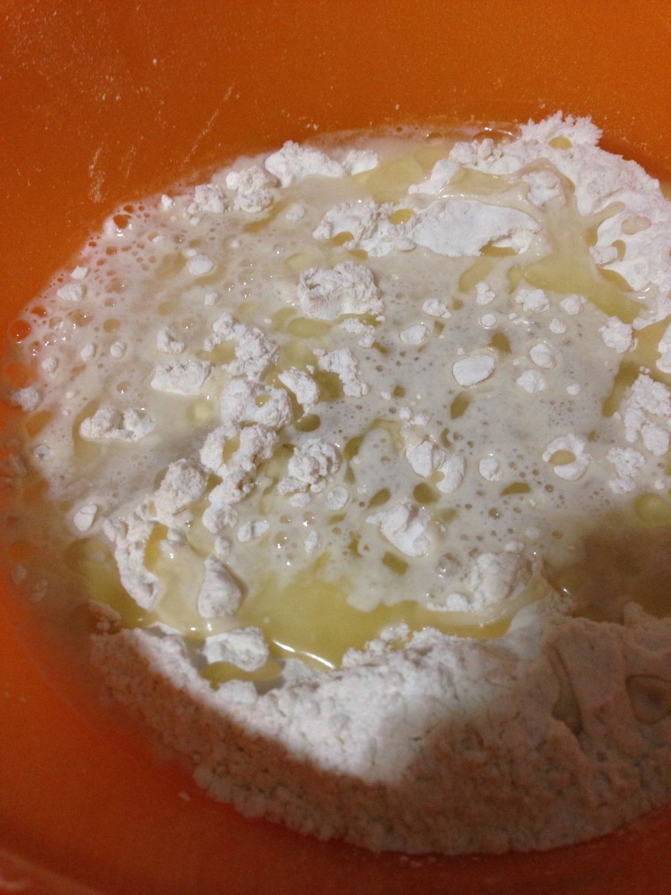 Mix all the ingredients together (except extra 2 table spoon of flour). If you don't have Manteca, you can substitute it with vegetable or olive oil.