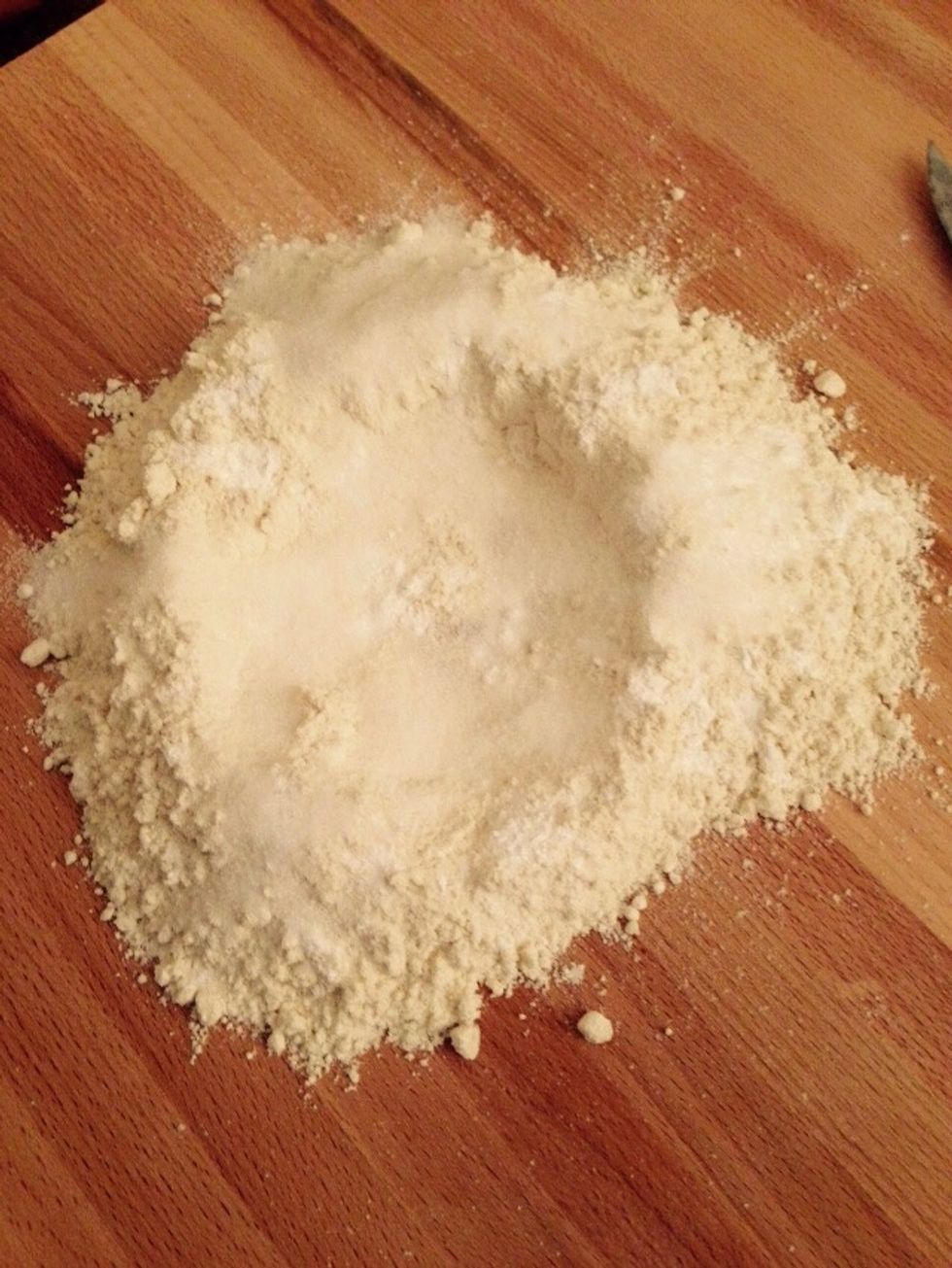 Mix all the powders together and make a hole in the middle.