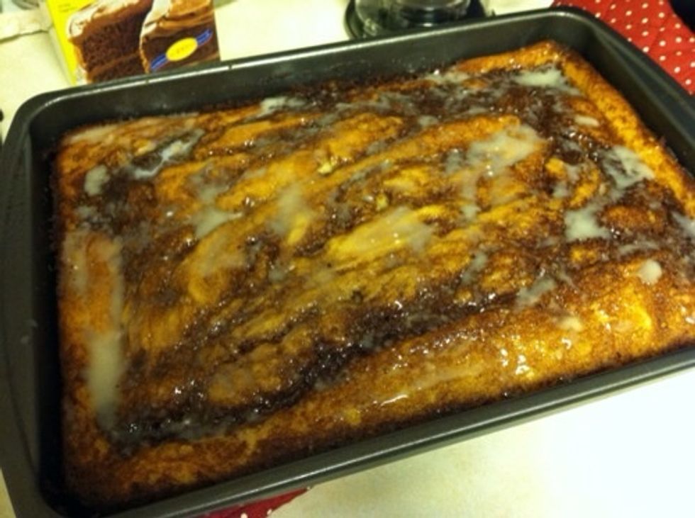 Mix all your ingredients for the glaze together and drizzle over cake while still warm.