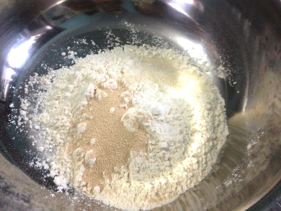 Mix altogether: 1 1/2cups of flour, 1/2 tbsp of instant yeast, 1/2 tsp of salt, 2 tbsp of sugar. Note: if you dont like yeast flavor, just add in 1 tsp of instant yeast ad let it double over 2-3 hours
