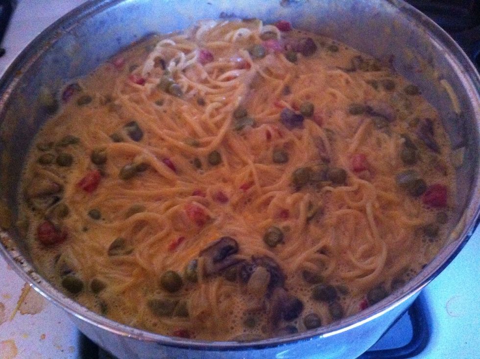 Mix and make sure cheese is completely melted then add chicken pieces