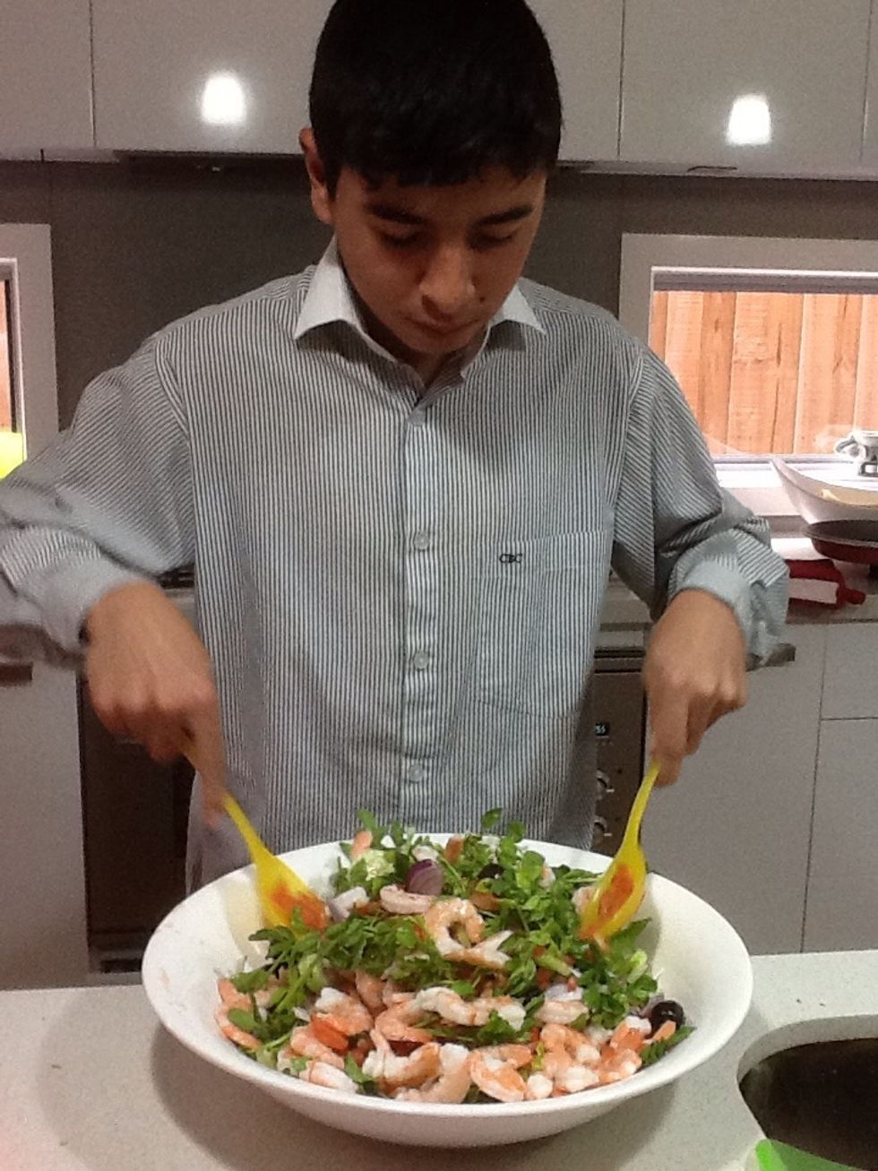 Mix and stir the salad around the bowl.