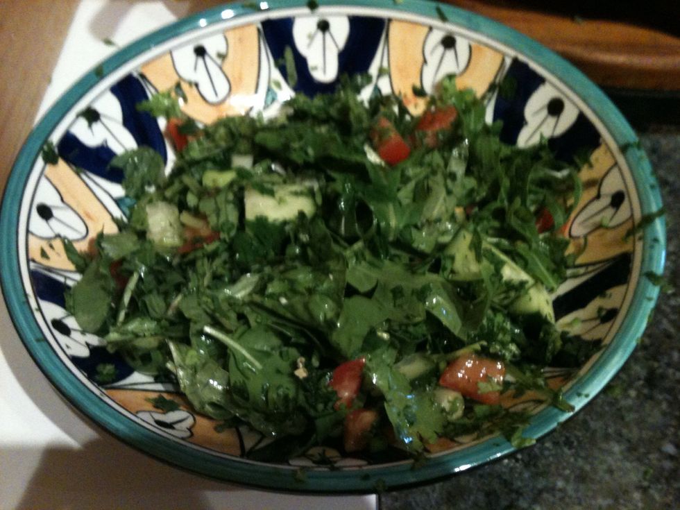 Mix and toss the vegetables and herbs in a bowl