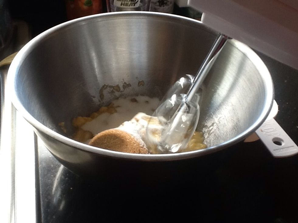 Mix banana, brown sugar, butter, sugar, and vanilla into bowl and mix with a mixer on medium speed until smooth.