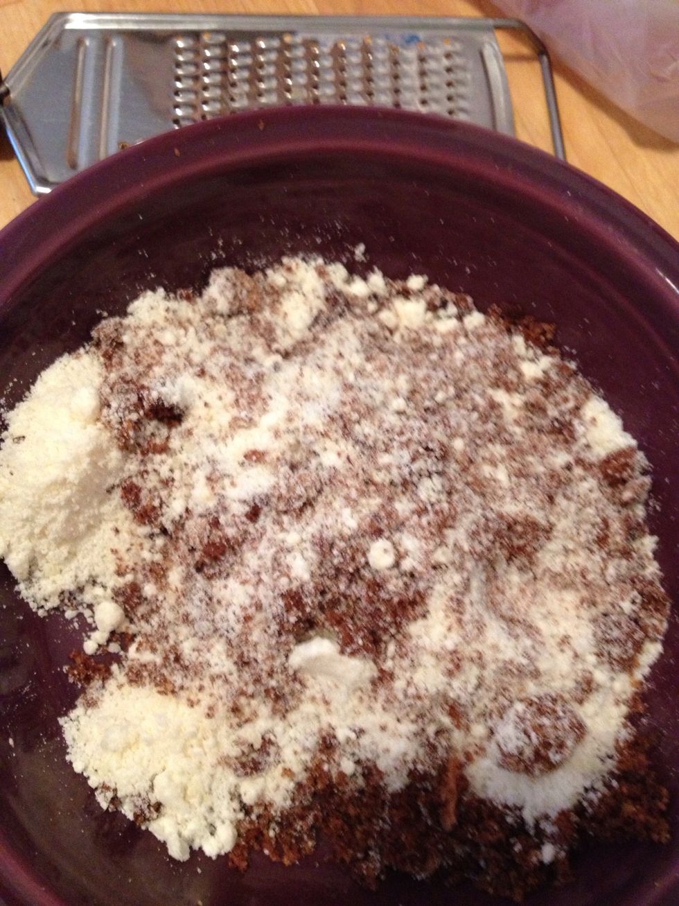 Mix bread crumbs with grated parmesan cheese.