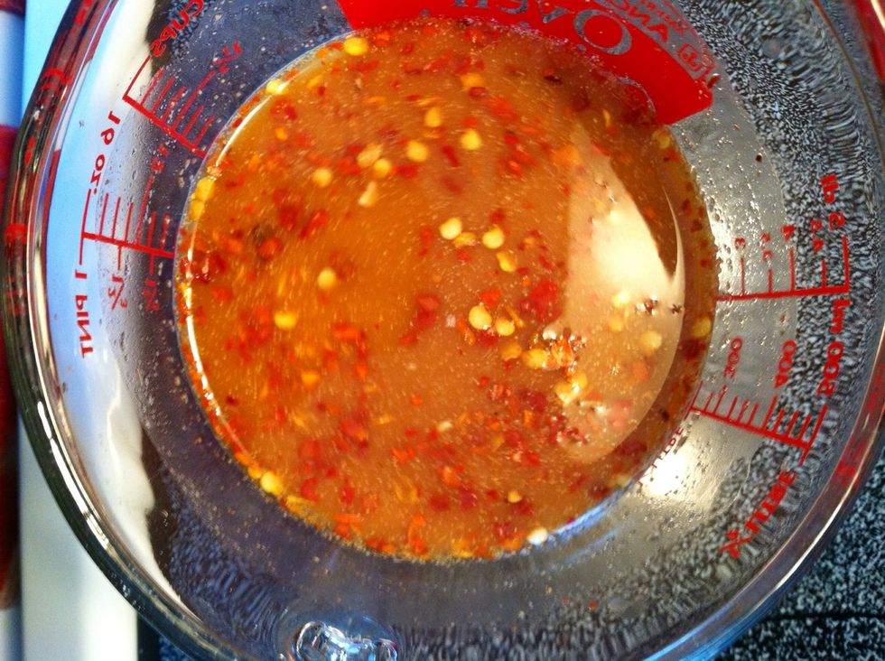 Mix broth, cornstarch, sugar, garlic (prepackaged), ginger, and red pepper in a small bowl and mix thoroughly. Set aside.....You'll need this for later.