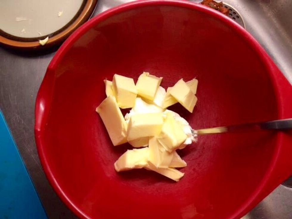 Mix butter and cream cheese. Add powdered sugar...