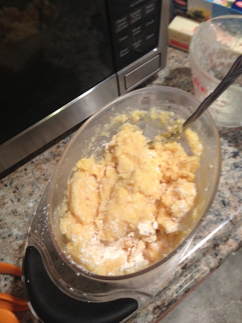 Mix cake mix, butter, and one egg