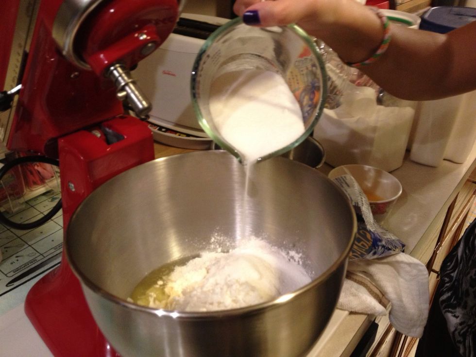 Mix cake mixes in two separate bowls as directed by the boxes / mix.