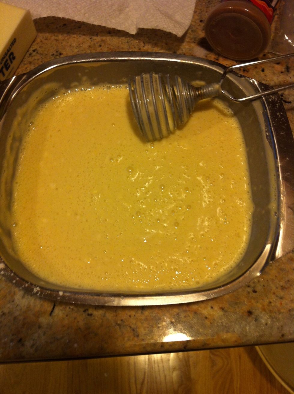 Mix carefully so as not to throw the flower everywhere. Try to get it as smooth as possible. It's ok if there are some lumps