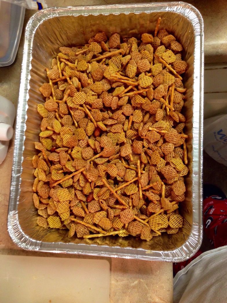 https://guides.brit.co/media-library/mix-cereal-nuts-pretzels-in-9x13x2-pan-set-aside.jpg?id=24167274&width=784&quality=85