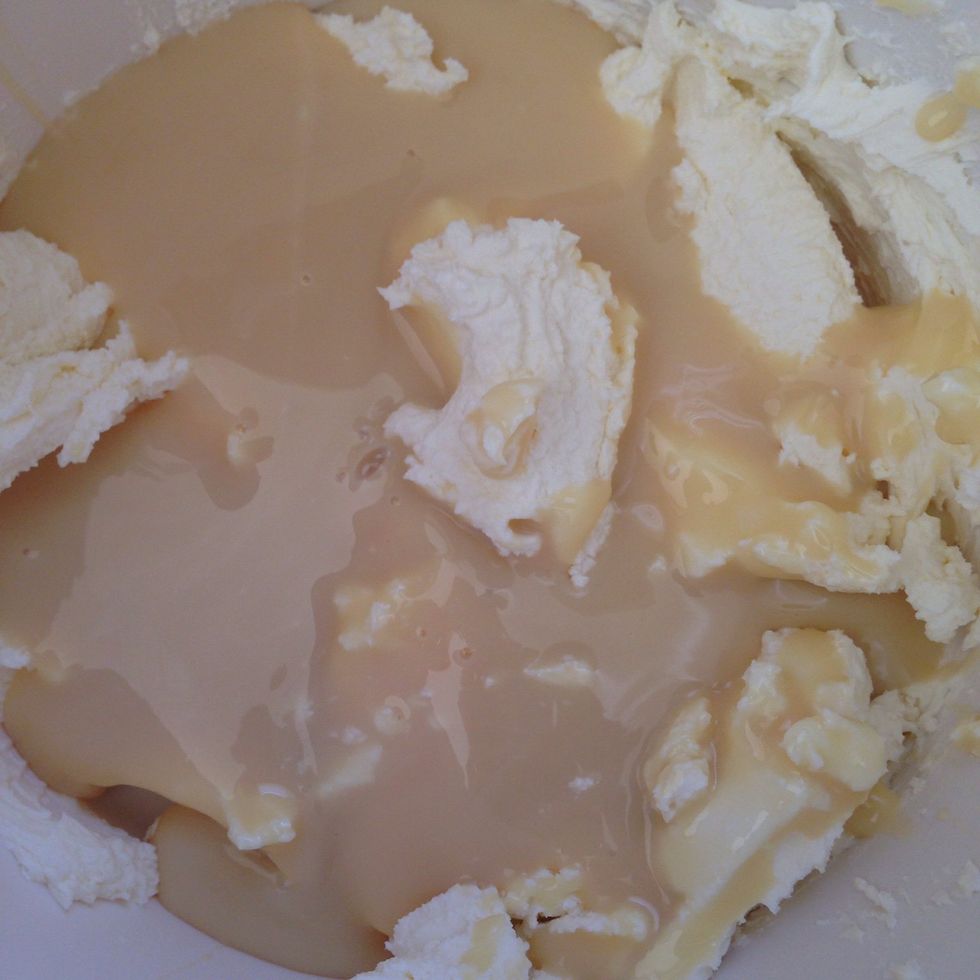 Mix cheese and condensed milk