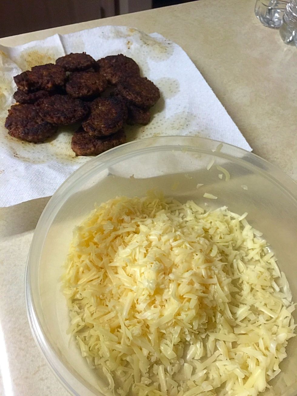 Mix cheese with sausage.