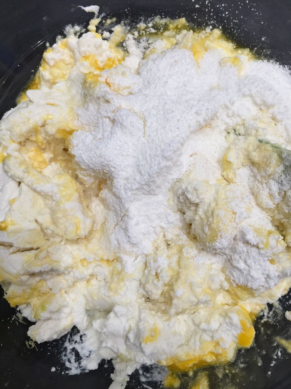 Mix cheese+yolks+zest. Then add flour sugar mixture