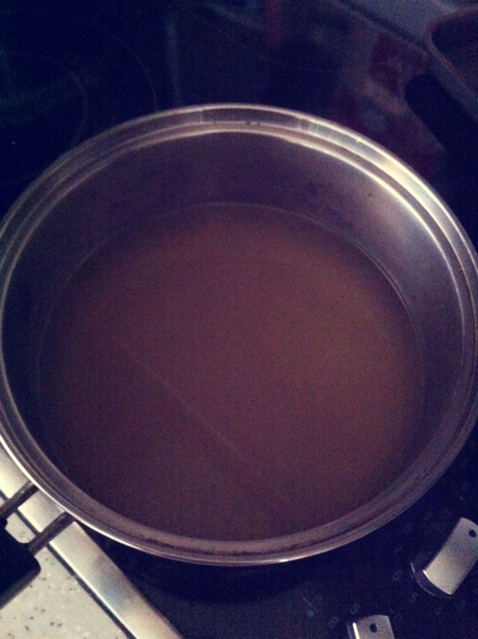 Mix chicken broth & water, bring to boil.