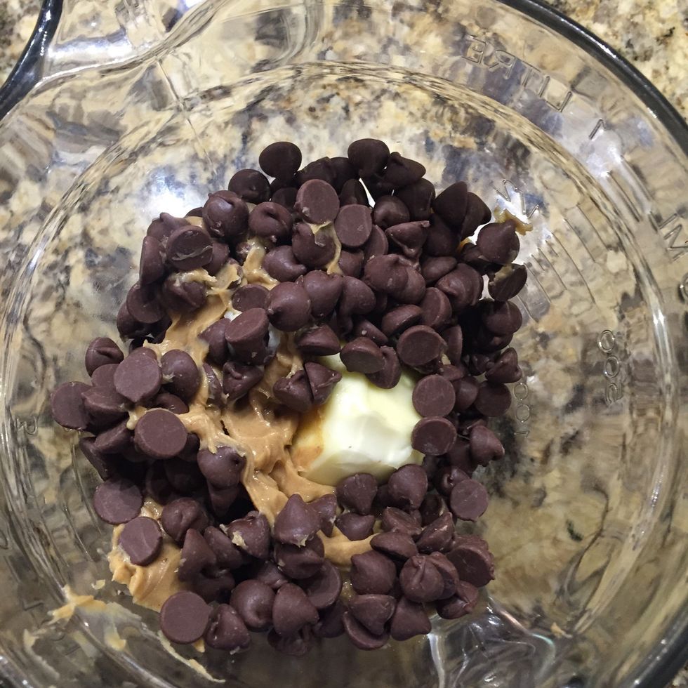 Mix chocolate chips, butter, and peanut butter in a small bowl