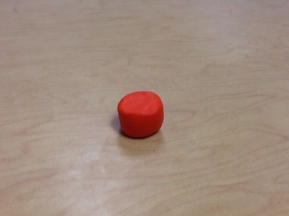 Mix clay to make a cupcake dough colored cupcake